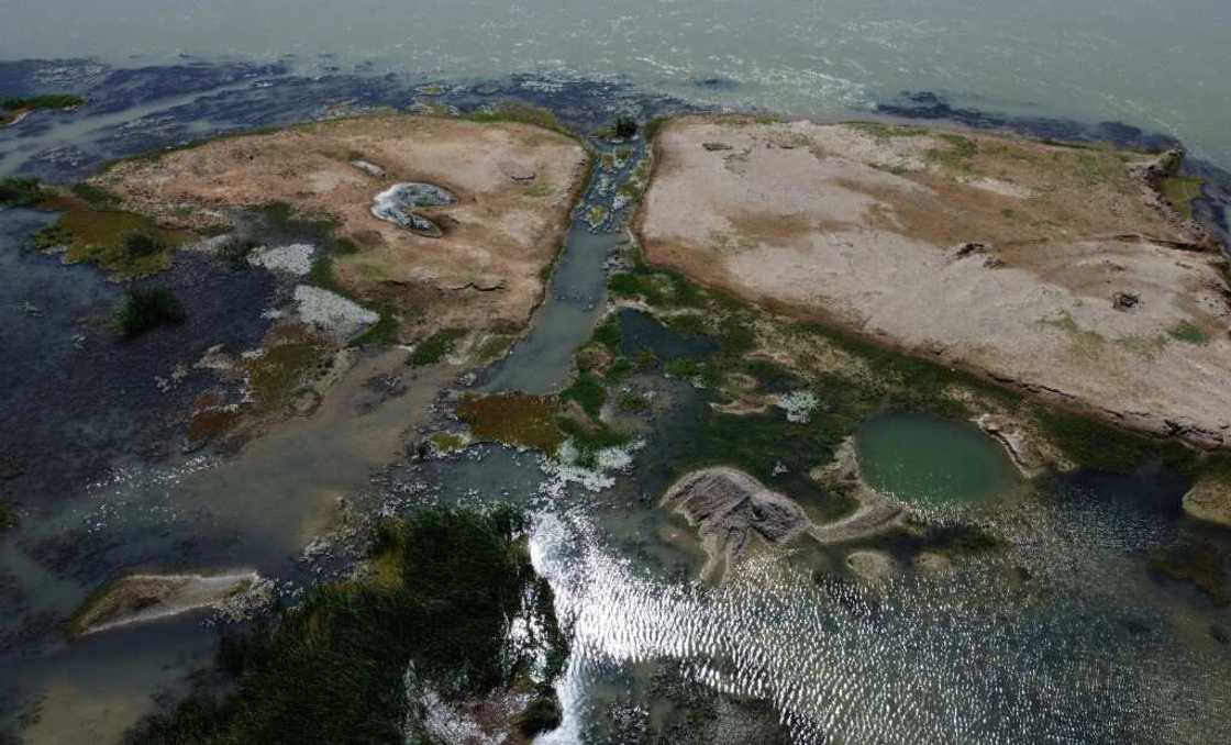 Drought and rising temperatures linked to climate change have severely diminished water levels, with the Euphrates experiencing historic lows Drought and rising temperatures linked to climate change have severely diminished water levels, with the Euphrates experiencing historic lows