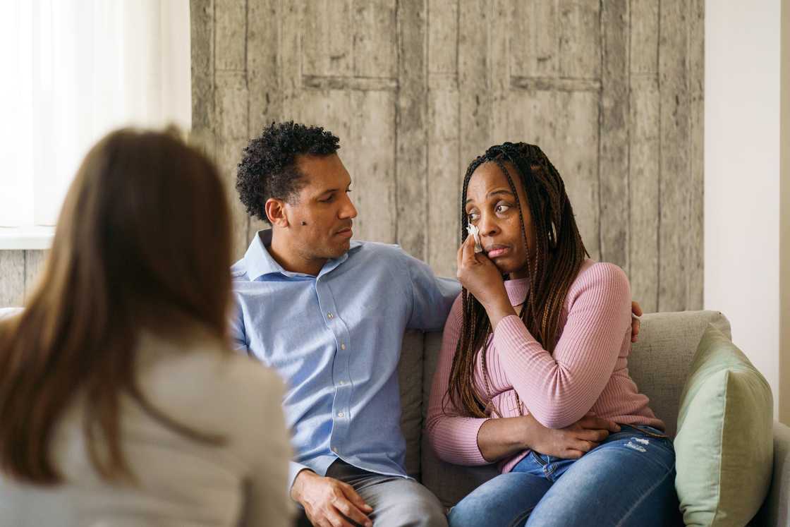 A woman crying during relationship counseling A woman crying during relationship counseling