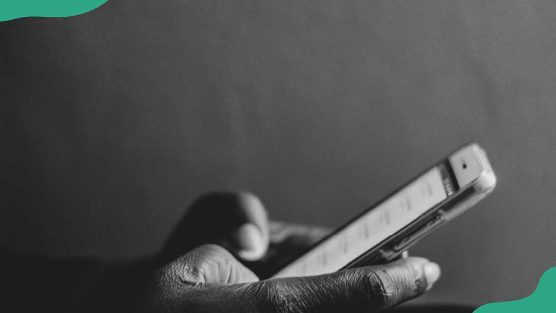 A person uses a smartphone A person uses a smartphone