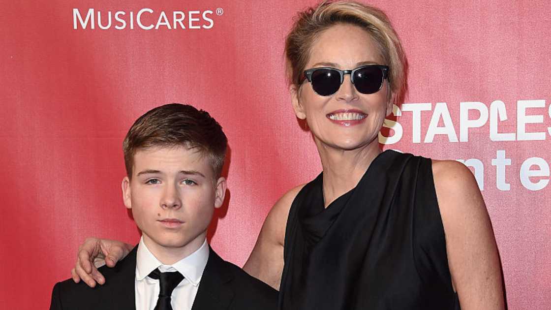 Sharon Stone and son Roan Bronstein at Los Angeles Convention Center. Sharon Stone and son Roan Bronstein at Los Angeles Convention Center.
