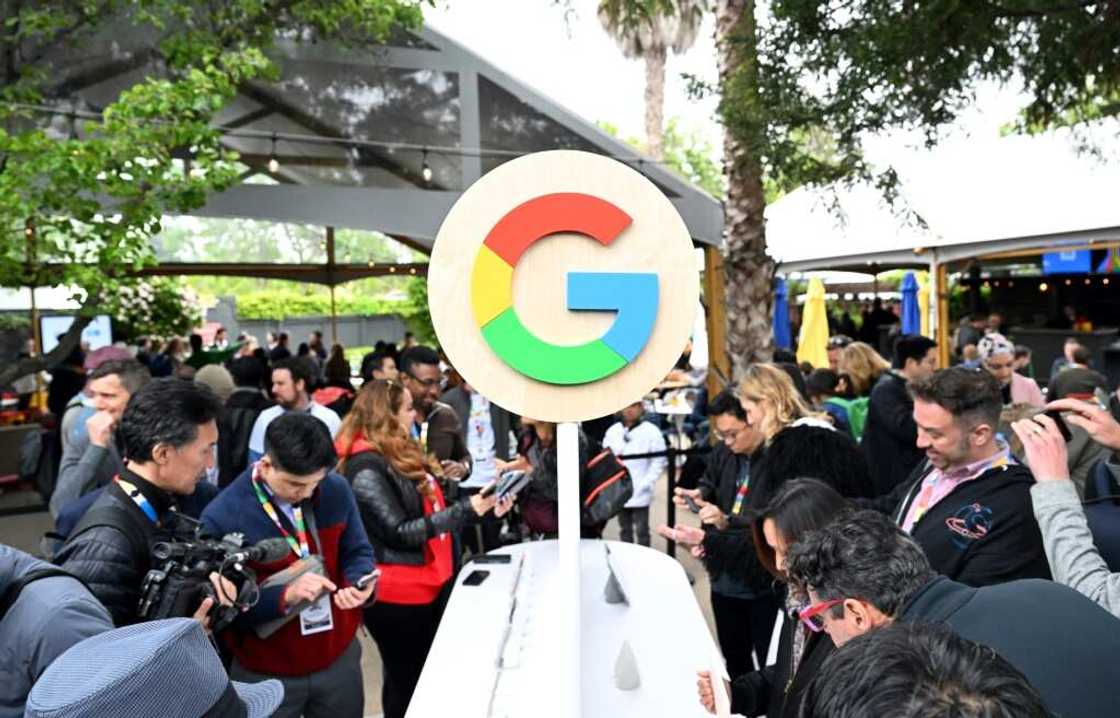 Visitors test Google's new products at an annual developers conference in May 2023 Visitors test Google's new products at an annual developers conference in May 2023
