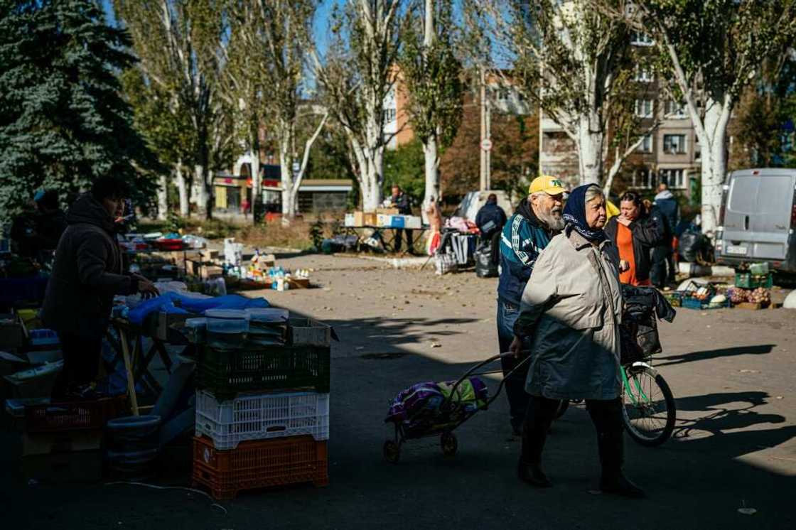 Some inhabitants of Donbas accept or support the idea of Moscow gaining control in the hope of ending the conflict or because of family ties in Russia