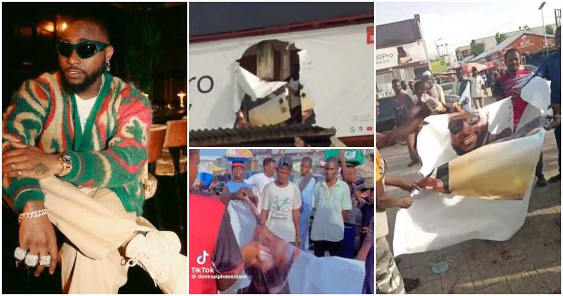 Youths tear down Davido's posters Youths tear down Davido's posters