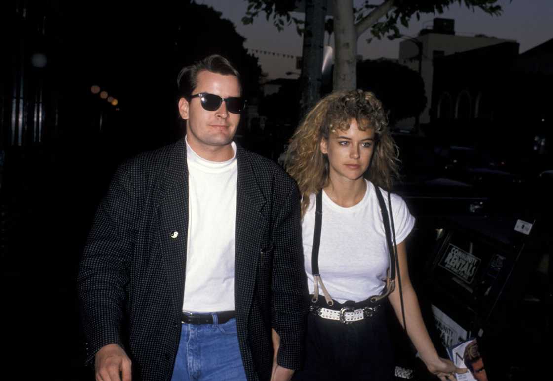Charlie Sheen and Kelly Preston attend an event