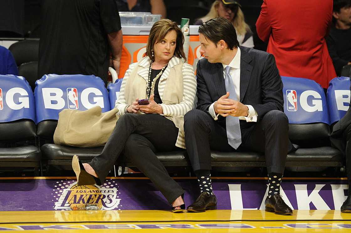 Ann and Josh Kroenke chat before game 7 of the first round of the NBA