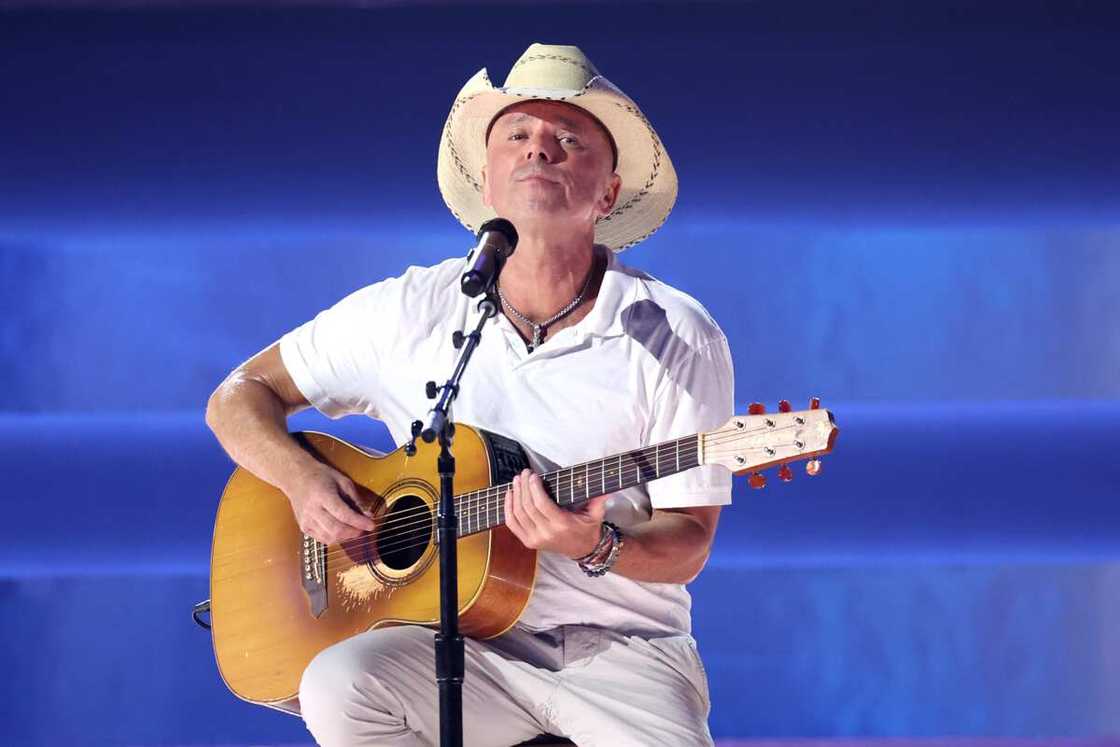Kenny Chesney performs onstage during the 57th Annual CMA Awards Kenny Chesney performs onstage during the 57th Annual CMA Awards