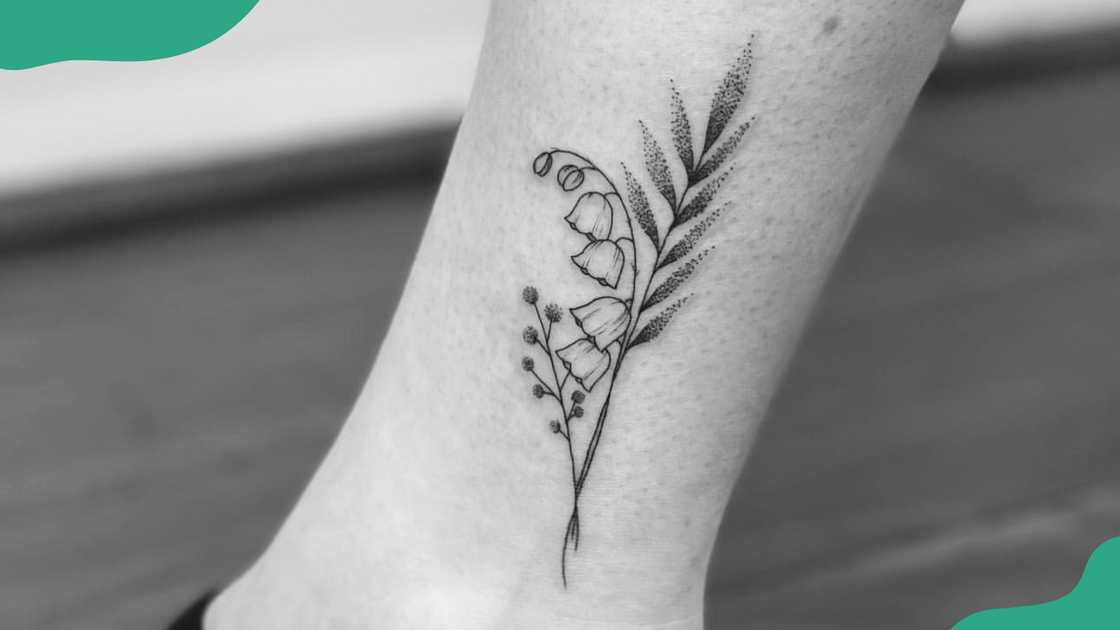 Fineline Lily of the Valley and fern tattoo