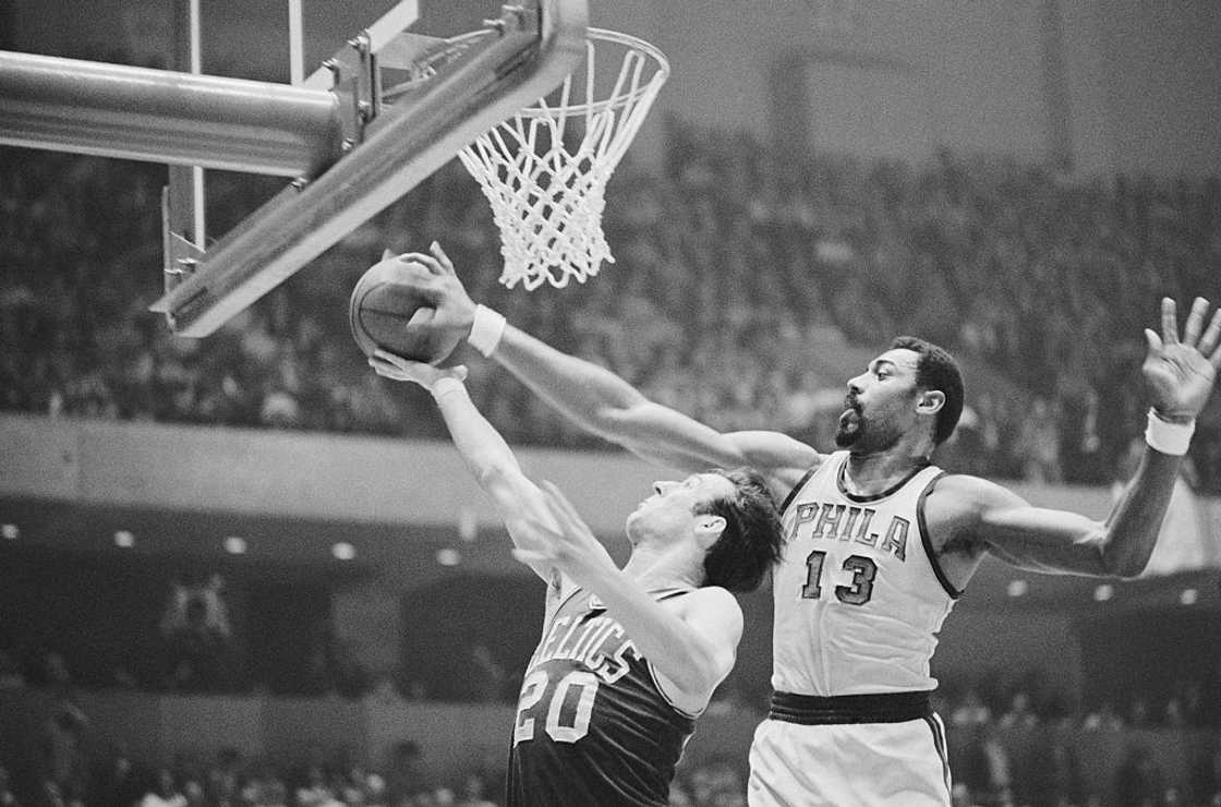 Wilt Chamberlain (13) in action during a basketball game Wilt Chamberlain (13) in action during a basketball game