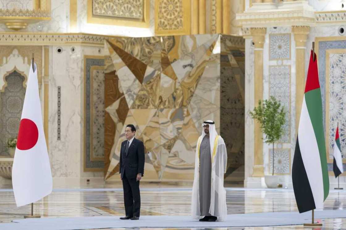 UAE President Sheikh Mohammed bin Zayed Al Nahyan (R) welcoming Japan's Prime Minister Fumio Kishida UAE President Sheikh Mohammed bin Zayed Al Nahyan (R) welcoming Japan's Prime Minister Fumio Kishida