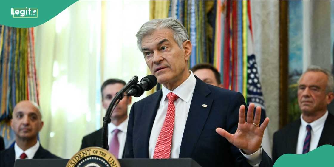 Trump apologizes for the interruption as the press conference resumes after the incident.