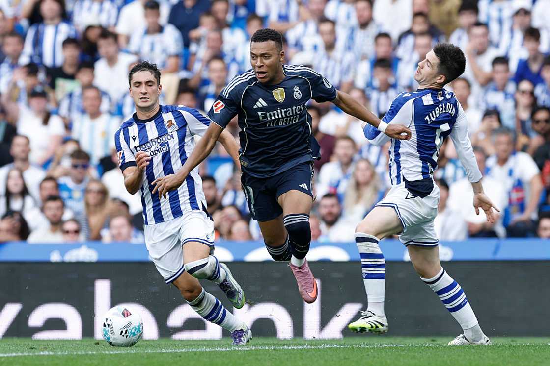 Kylian Mbappe player of Real Madrid and Igor Zubeldia battle for the ball Kylian Mbappe player of Real Madrid and Igor Zubeldia battle for the ball