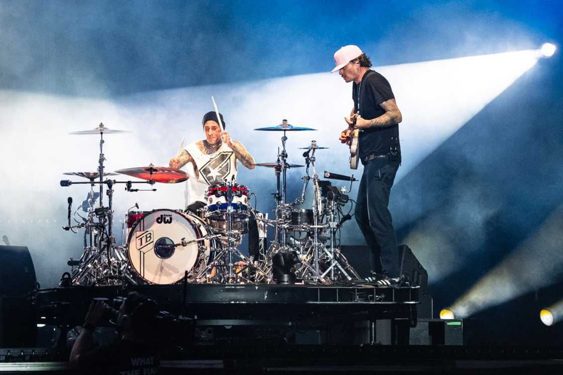 Travis Barker and Tom DeLonge of Blink-182 perform at a concert in Chicago Travis Barker and Tom DeLonge of Blink-182 perform at a concert in Chicago