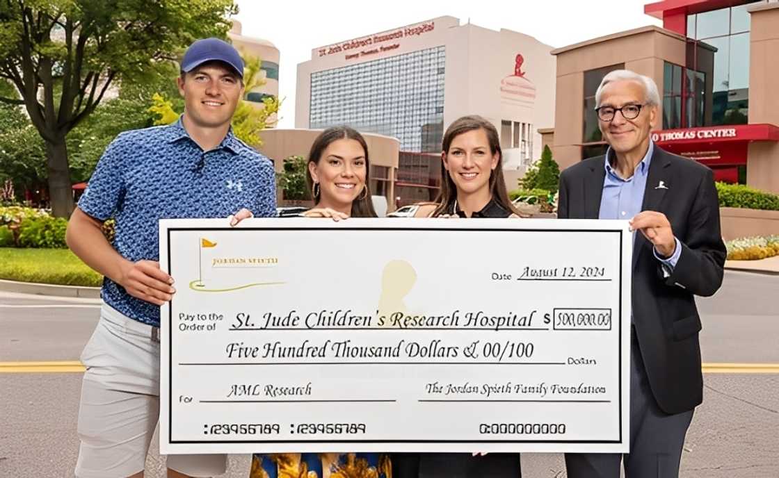 Jordan Spieth and his wife, Annie, present a check of $500,000 for St. Jude Children's Research Hospital. Jordan Spieth and his wife, Annie, present a check of $500,000 for St. Jude Children's Research Hospital.