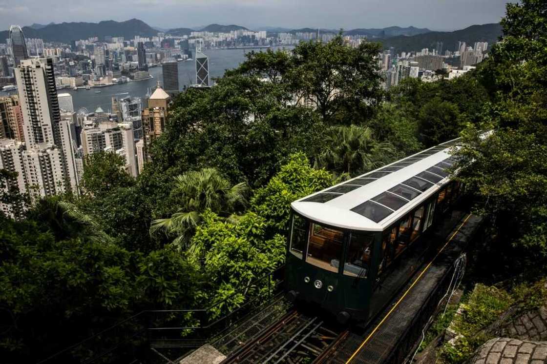 The Peak Tram reopened Saturday after a year-long $102 million facelift even as the city's coronavirus curbs continue to keep overseas visitors at bay The Peak Tram reopened Saturday after a year-long $102 million facelift even as the city's coronavirus curbs continue to keep overseas visitors at bay