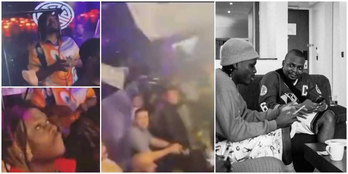 Olamide and Fireboy scatter club in US,rain cash as Oyinbo clubbers look on, video causes stir