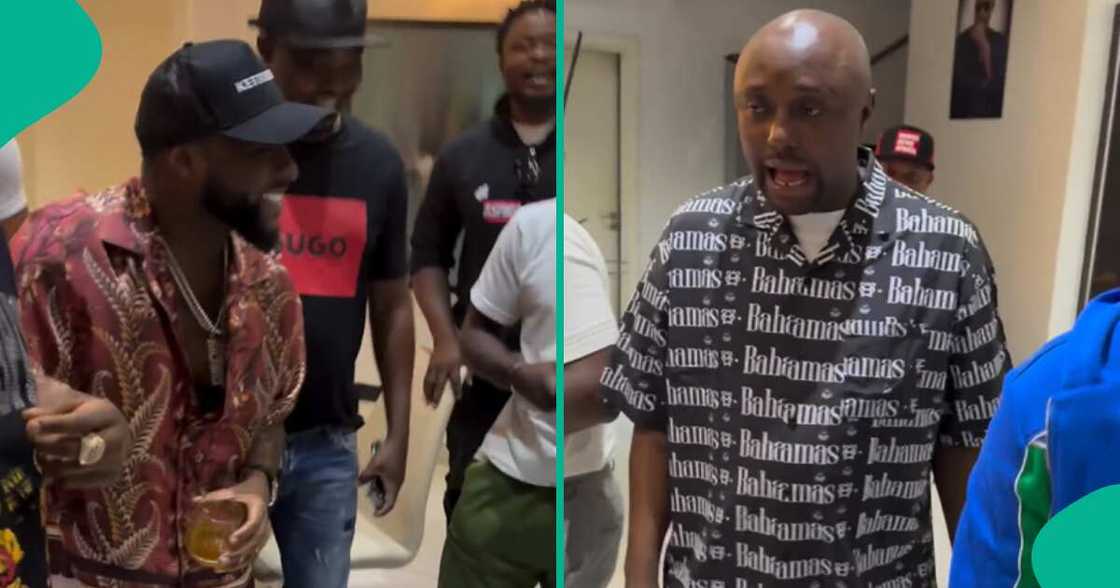 Davido laughs hard at Isreal DMW's display. Davido laughs hard at Isreal DMW's display.