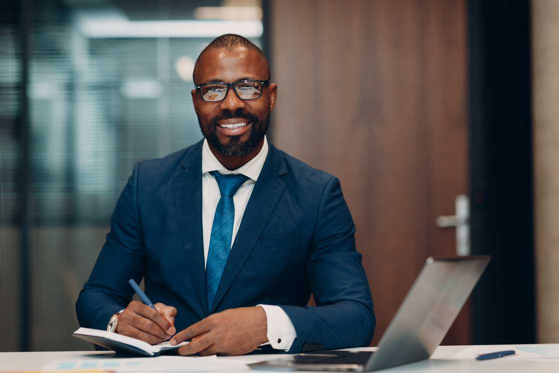 A businessman in blue suit.