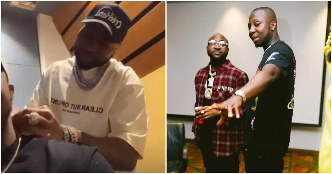 Davido and aide. Davido and aide.