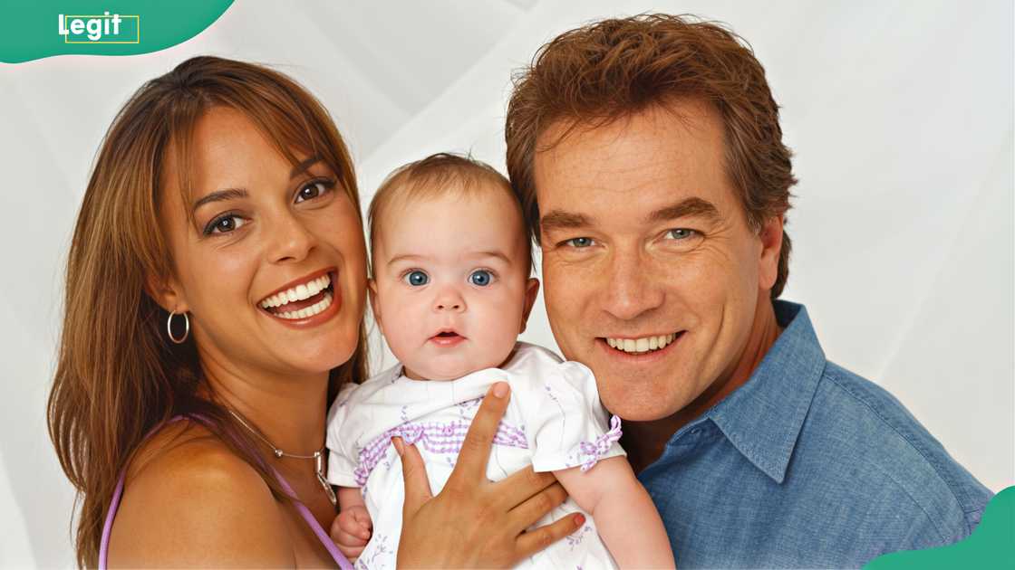 Eva LaRue and John Callahan pose with their daughter, Kaya McKenna