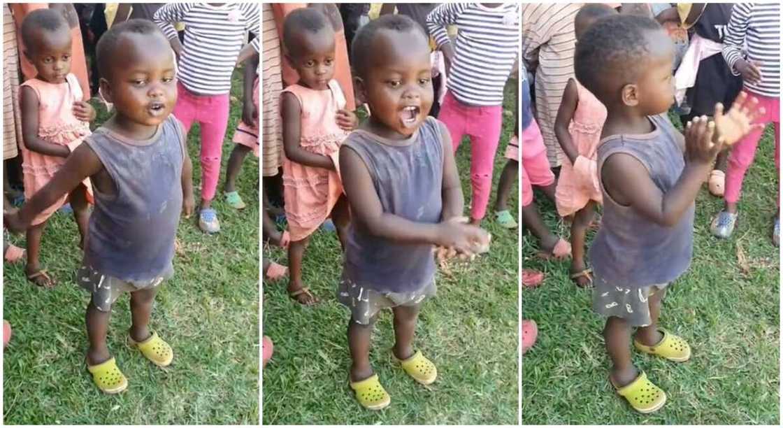 Photos of a boy standing with other childing. Photos of a boy standing with other childing.