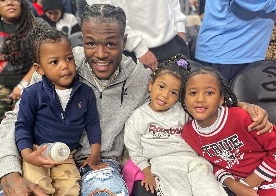 Comedian DC Young Fly and his three kids Comedian DC Young Fly and his three kids