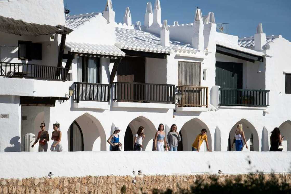 Every year, nearly 800,000 tourists flock to Binibeca Vell to have their photographs taken inside this picturesque whitewashed village Every year, nearly 800,000 tourists flock to Binibeca Vell to have their photographs taken inside this picturesque whitewashed village