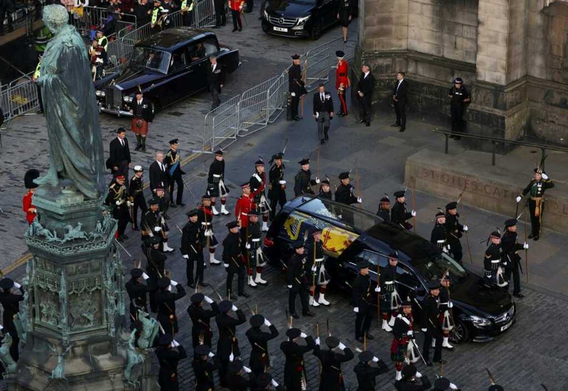 Accompanied by kilted soldiers, the late queen was taken from the royal residence of the Palace of Holyroodhouse where she had rested overnight to St Giles' for a prayer service Accompanied by kilted soldiers, the late queen was taken from the royal residence of the Palace of Holyroodhouse where she had rested overnight to St Giles' for a prayer service