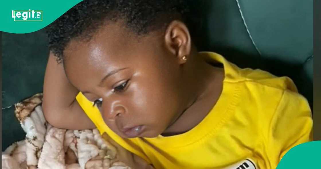Nigerian kid in funny deep thought Nigerian kid in funny deep thought