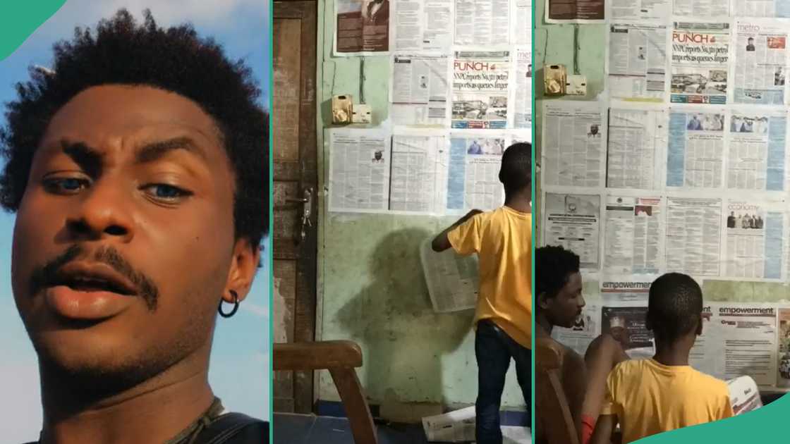 Man uses newspapers to wrap the walls in his room. Man uses newspapers to wrap the walls in his room.