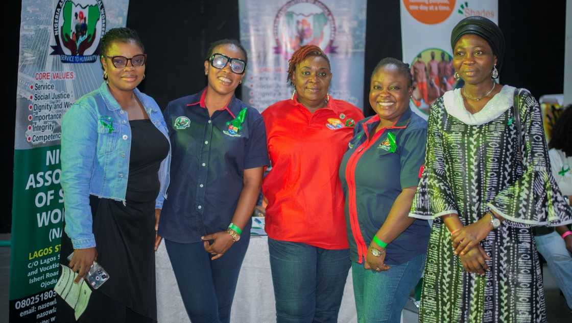 Nigerian social workers stand at their exhibition stand during the World Mental Health Day Awakening Summit. Nigerian social workers stand at their exhibition stand during the World Mental Health Day Awakening Summit.