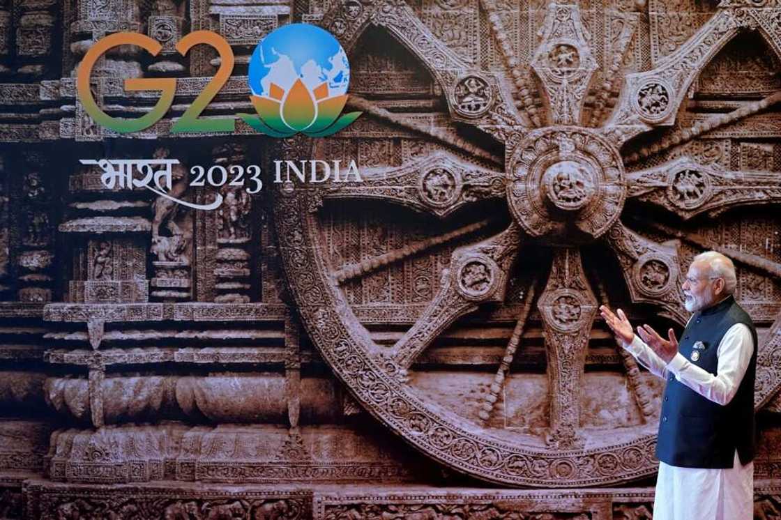 India's Prime Minister Narendra Modi gestures upon the arrival of US President Joe Biden (not pictured) ahead of the G20 Leaders' Summit in New Delhi India's Prime Minister Narendra Modi gestures upon the arrival of US President Joe Biden (not pictured) ahead of the G20 Leaders' Summit in New Delhi