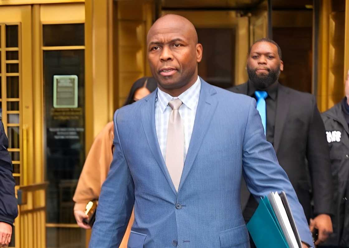 Sharrieff Shah is seen in a blue suit and a file leaving Manhattan federal court Sharrieff Shah is seen in a blue suit and a file leaving Manhattan federal court