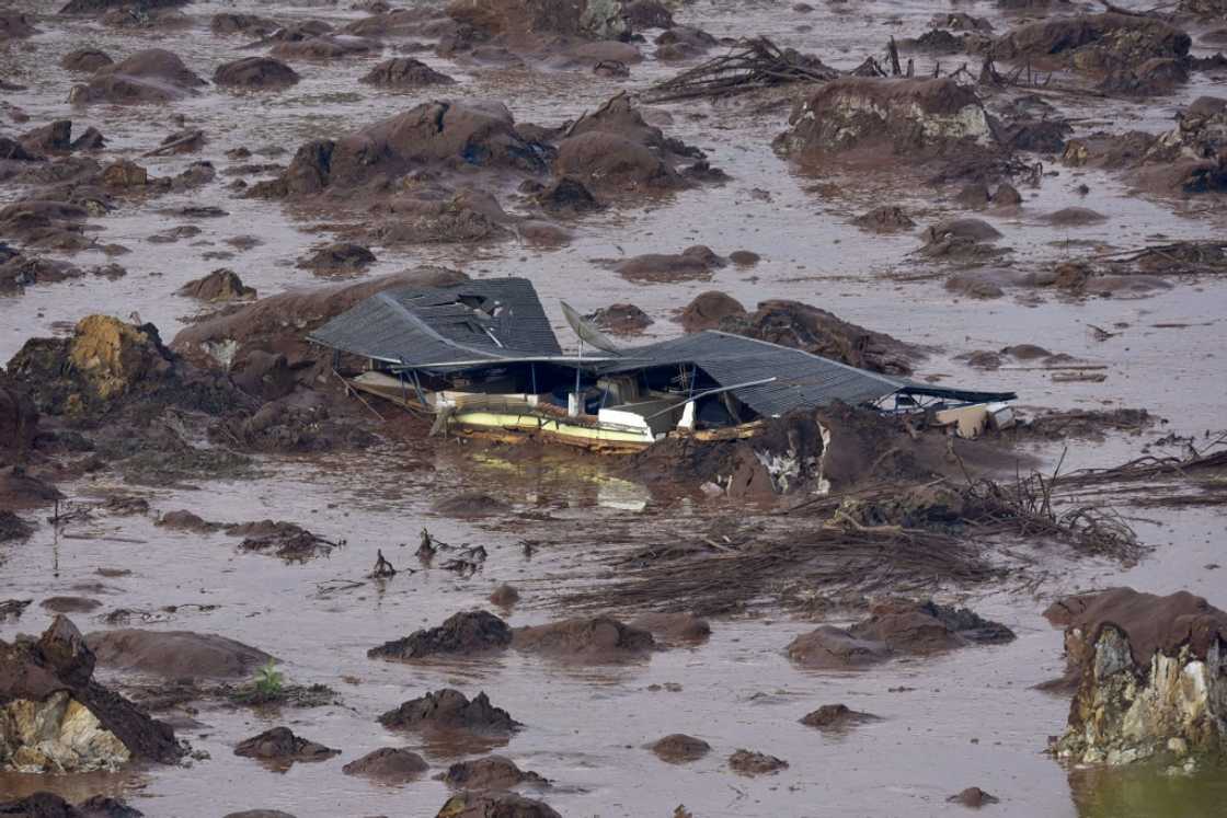 The dam collapse triggered a giant landslide that flooded villages, rivers and rainforests, killing 19 people.