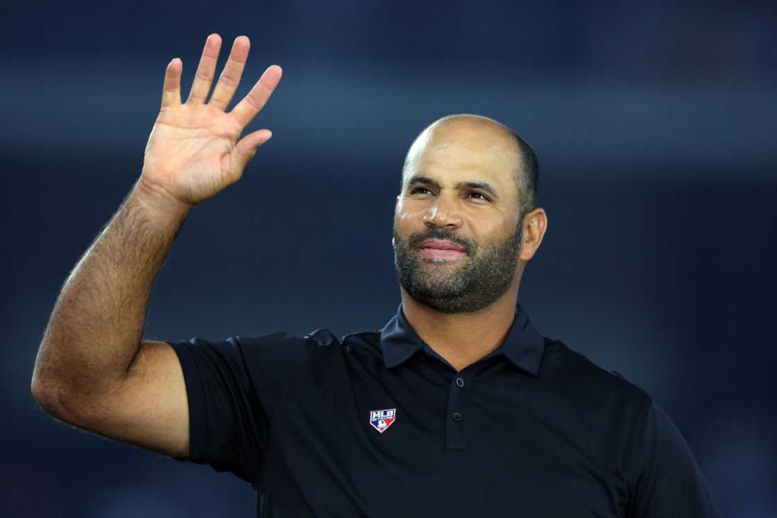 Albert Pujols waves at the crowd Albert Pujols waves at the crowd