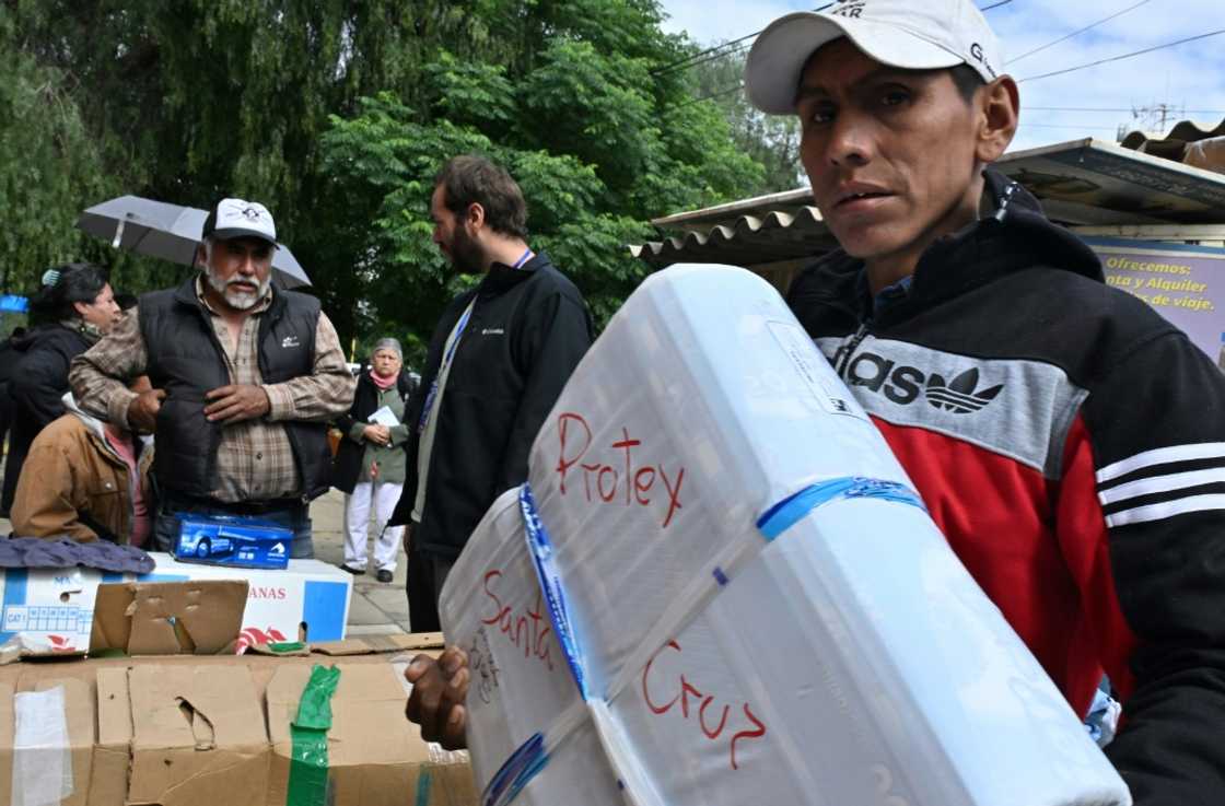 Food producers have begun shipping their food by plane, such as these at the Boliviana de Aviacion parcel office in Cochabamba