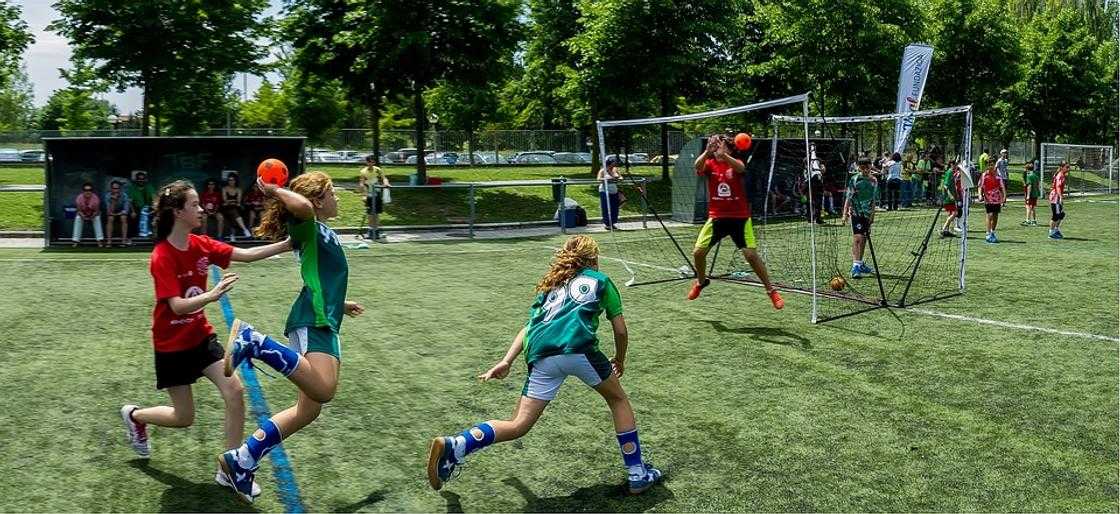 A team of players playing handball