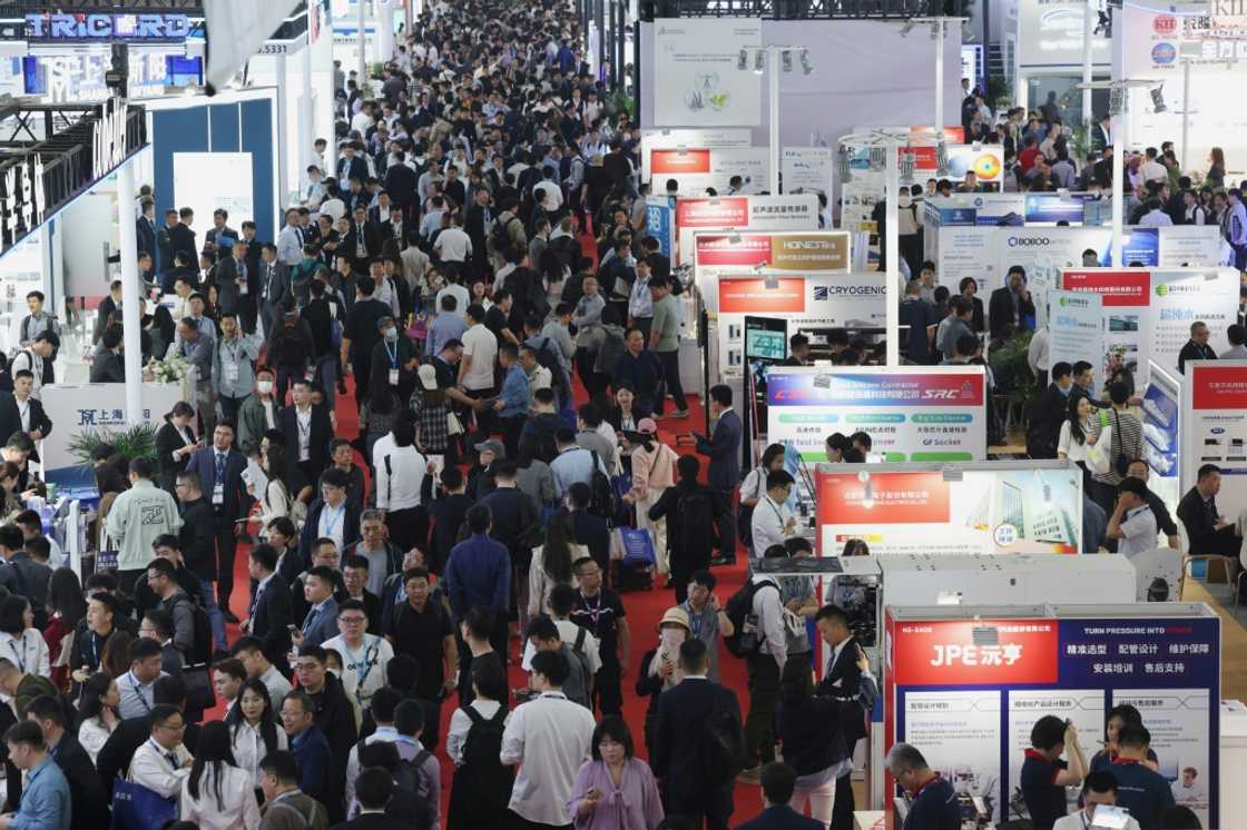 People attend the SEMICON China semiconductor exhibition in Shanghai on March 26, 2025. People attend the SEMICON China semiconductor exhibition in Shanghai on March 26, 2025.