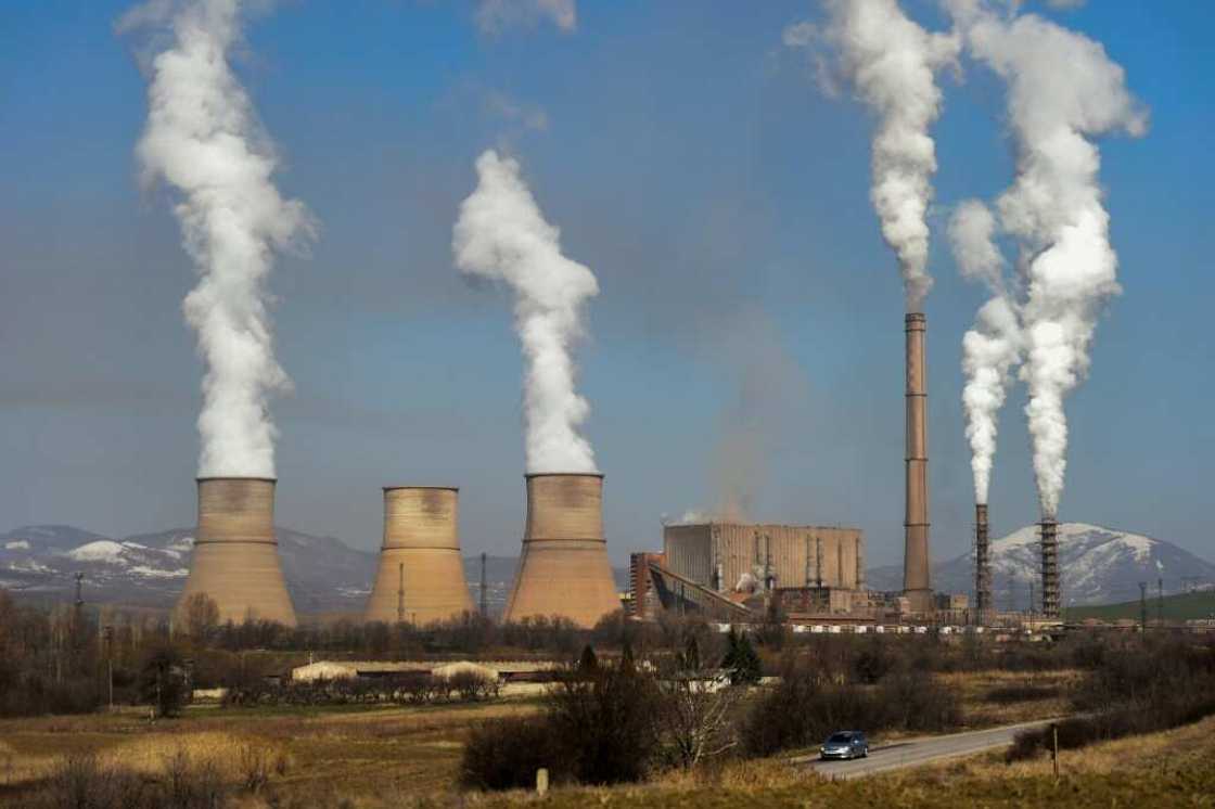 The EU is broadening an emissions trading scheme to more industries and lowering quotas of allowable polluting gases The EU is broadening an emissions trading scheme to more industries and lowering quotas of allowable polluting gases