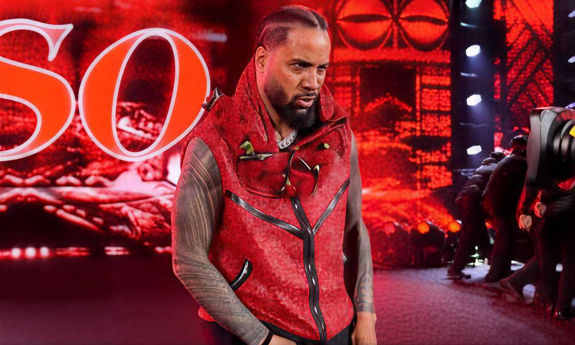 Jimmy Uso walks onto a WWE stage.
