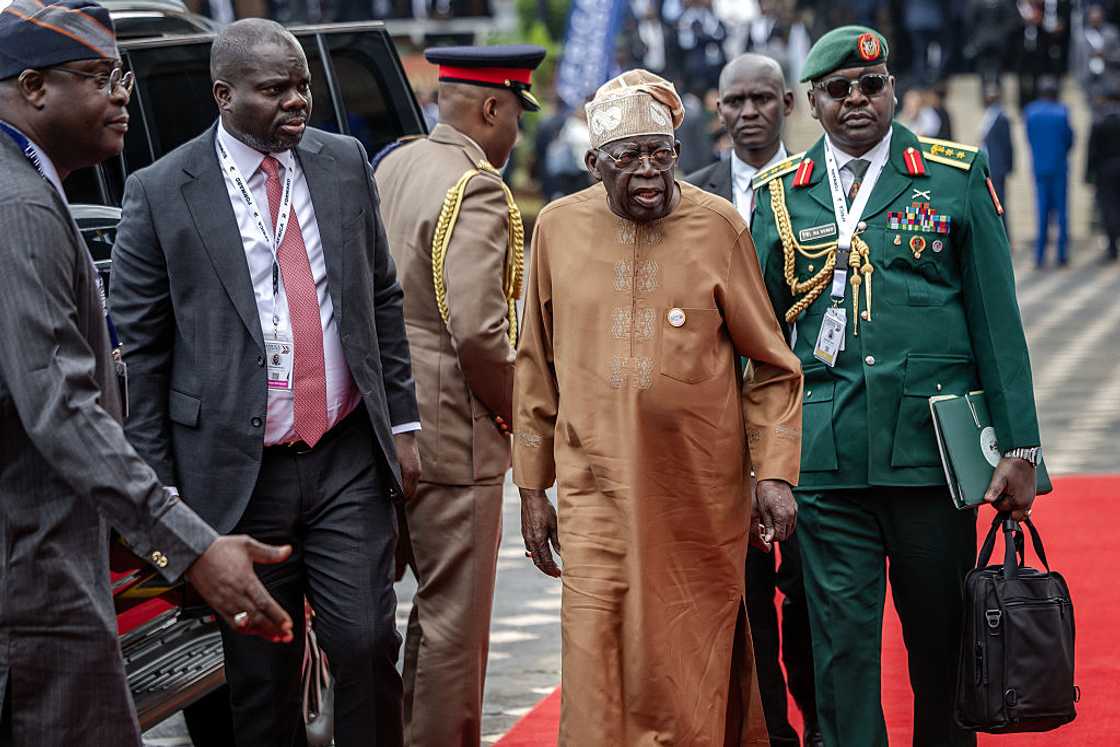 Nigeria's President Bola Tinubu (2nd R) arrives for the Africa Forward Summit Nigeria's President Bola Tinubu (2nd R) arrives for the Africa Forward Summit
