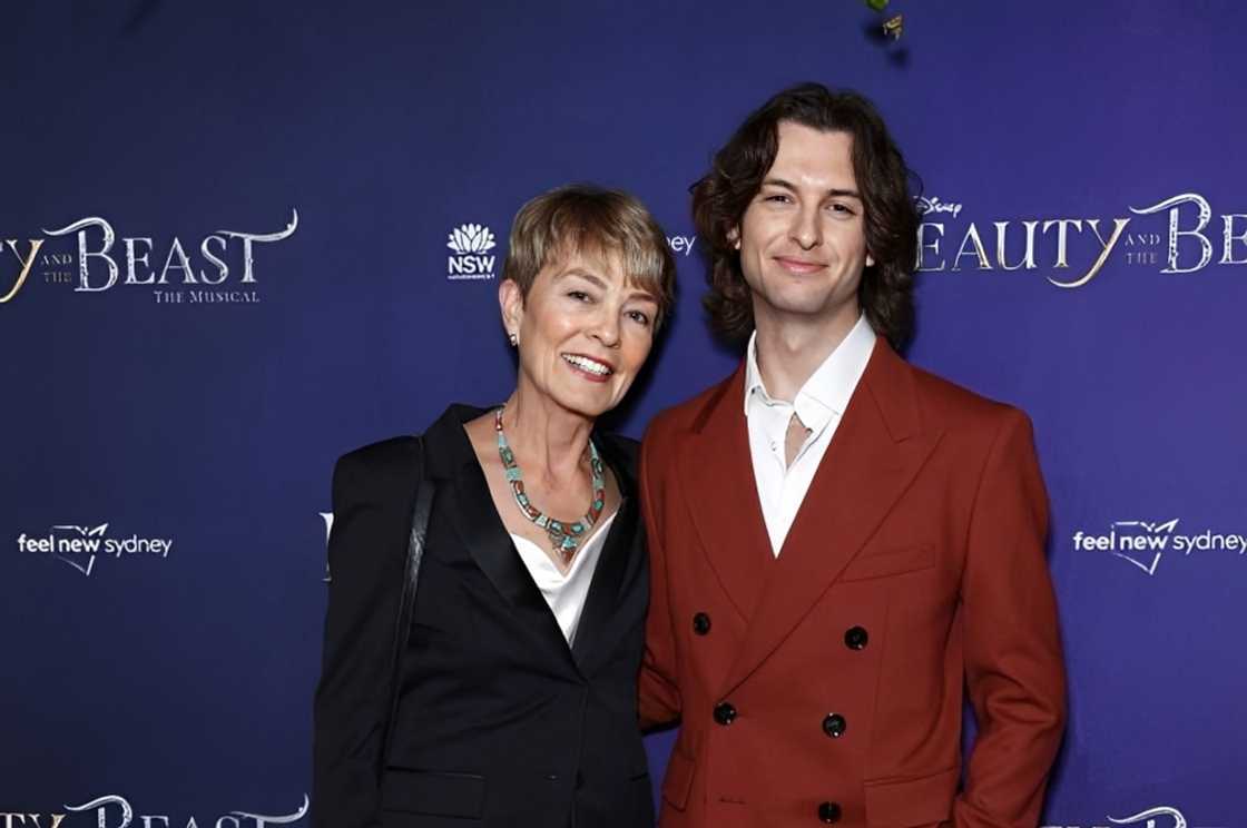 Sarie Kessler and her son, Cameron Robbie, attend an event at the Capitol Theatre Sarie Kessler and her son, Cameron Robbie, attend an event at the Capitol Theatre