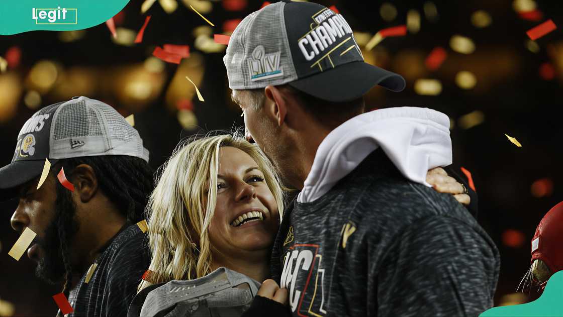 Head Coach Kyle Shanahan stands with his wife, Mandy, at Levi's Stadium Head Coach Kyle Shanahan stands with his wife, Mandy, at Levi's Stadium