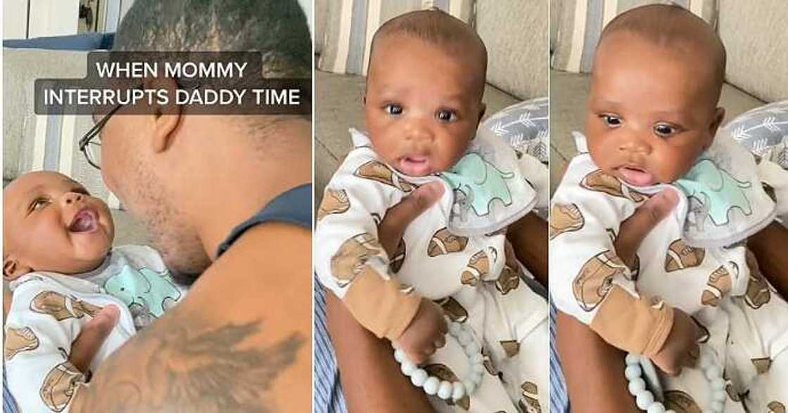 Mum interrupts baby and dad, stern look Mum interrupts baby and dad, stern look