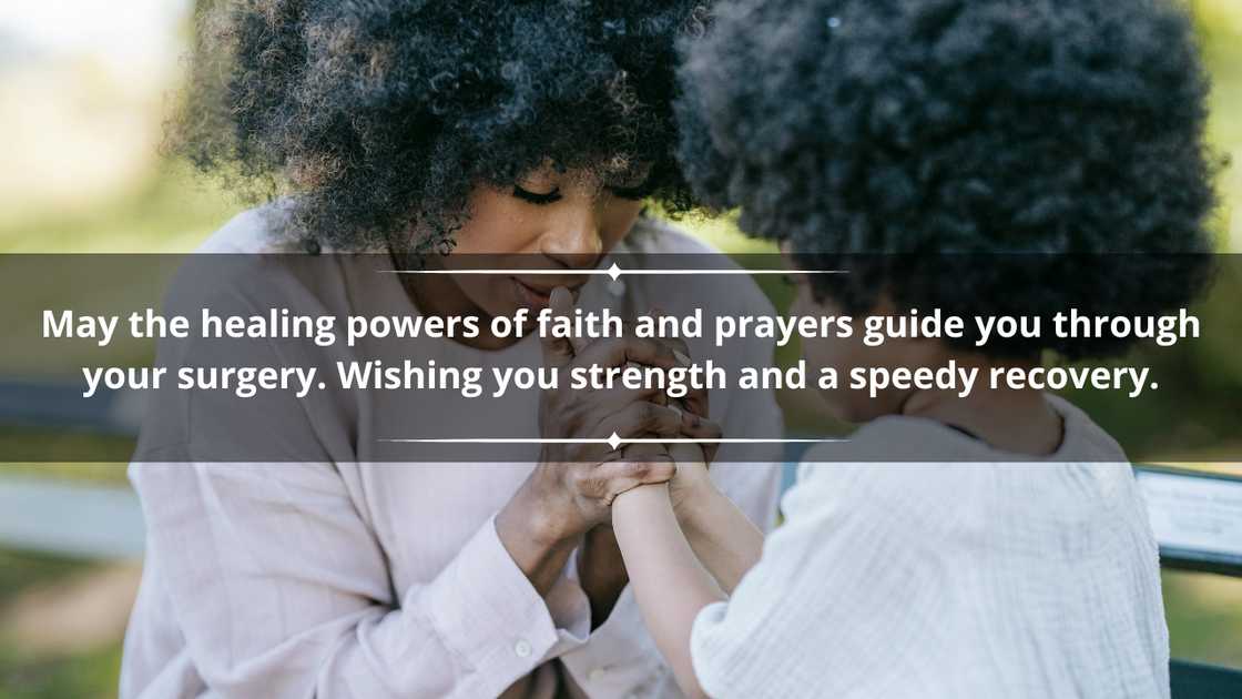 A mother and her little girl are holding their hands in prayer