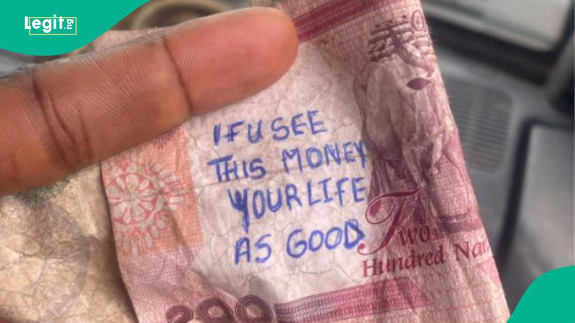 Man shares what was written on naira note given to him as change.