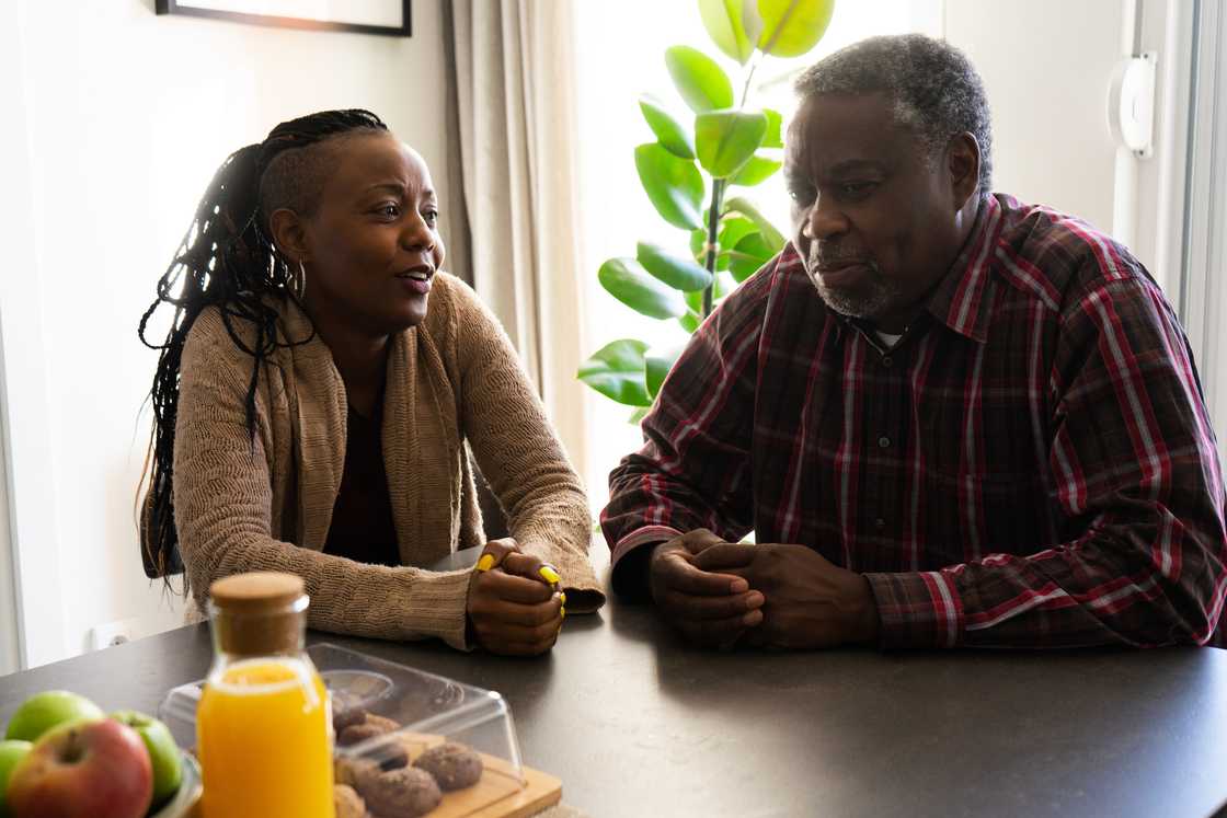 A man and woman talking