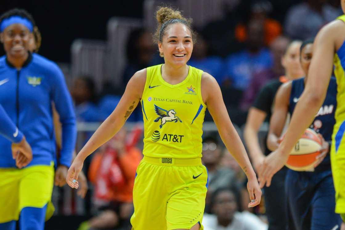 Brooke McCarty-Williams reacts after scoring during the WNBA game between the Atlanta Dream and the Dallas Wings