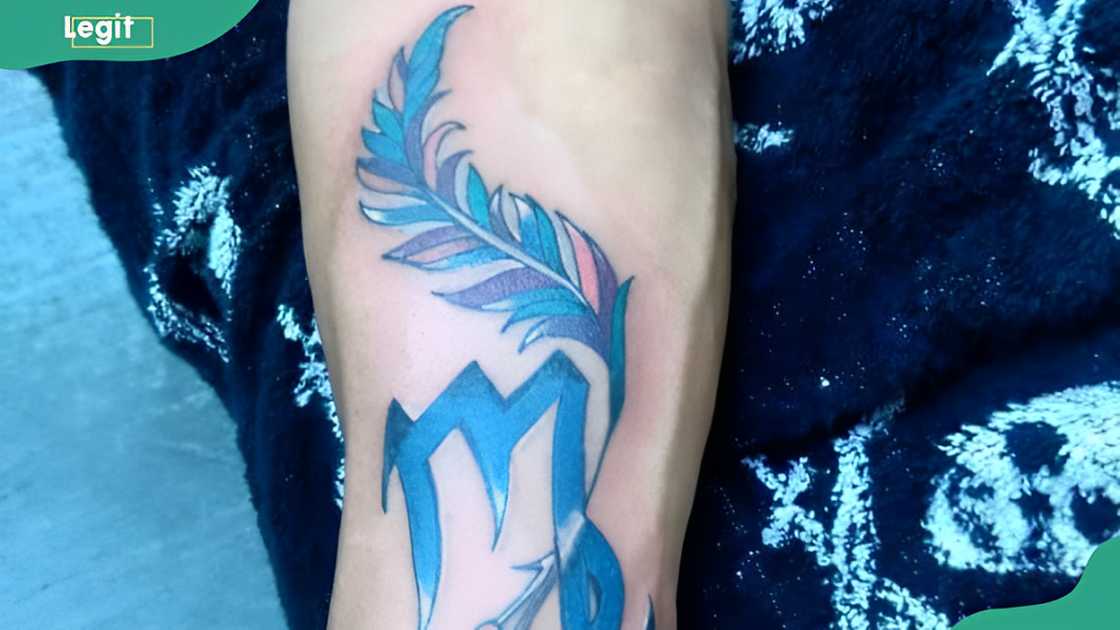 Virgo and feathers tattoo