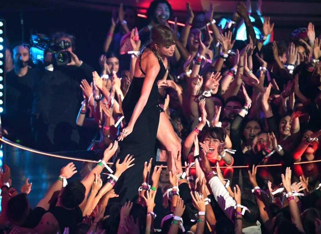 Taylor Swift greets fans during the MTV Video Music Awards at the Prudential Center in Newark, New Jersey, on September 12, 2023 Taylor Swift greets fans during the MTV Video Music Awards at the Prudential Center in Newark, New Jersey, on September 12, 2023