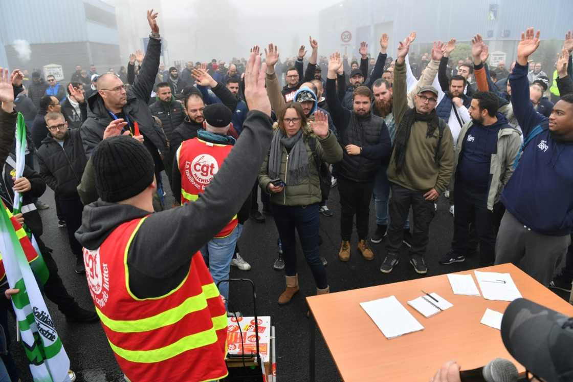Workers take part in a general assembly at the Michelin plant in Cholet, western France Workers take part in a general assembly at the Michelin plant in Cholet, western France